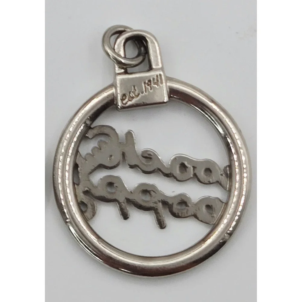 Coach Silver Metal Round Disc 